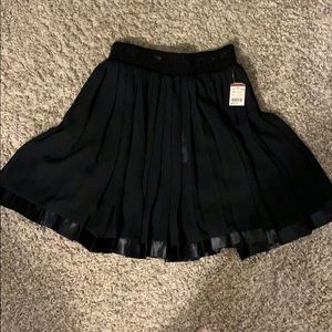 Sheer black pleated skirt